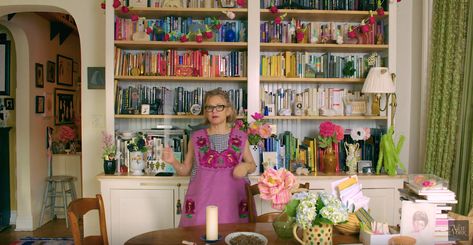 #DesignPorn: “At (Her ACTUAL) Home with Amy Sedaris” (A Video Tour. Beware of Rabbit.) Watch Amy Sedaris Apartment, Greenwich Apartment, Yellow Cupboards, Greenwich Village Apartment, White Rocking Chairs, Amy Sedaris, Pink Armchair, Chimney Breast, Apartment Organization