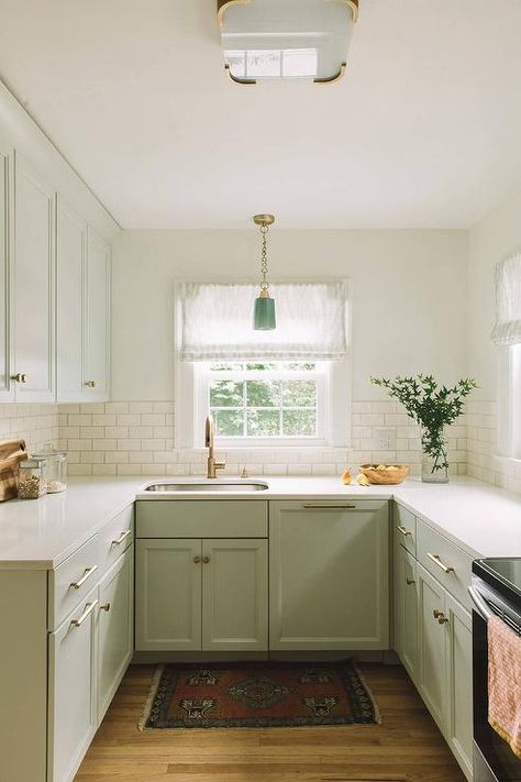 Soft green kitchen cabinets U Shaped Kitchen With Peninsula, Small U Shaped Kitchens, Small U Shaped Kitchen, Kitchen With Peninsula, Galley Kitchen Remodel, Shaped Kitchen, Kabinet Dapur, U Shaped Kitchen, Kitchen Remodel Before And After