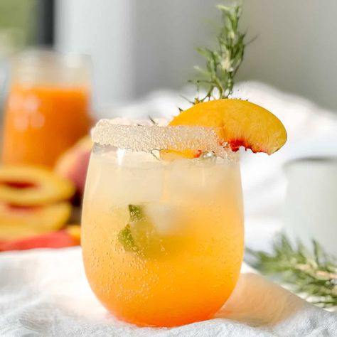 This Rosemary Peach Mocktail is a delicious and refreshing non-alcoholic summer drink, using homemade rosemary peach nectar, that everyone will love! Peach Nectar, Peach Sangria, Summer Drinks Alcohol, Peach Bellini, Peach Juice, Ingredient Substitutions, Refreshing Summer Drinks, Summer Drink, Mocktail Recipe