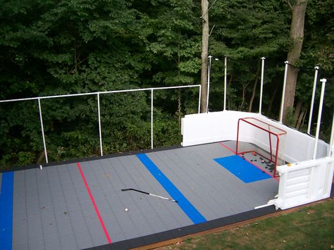 ProWall dasher boards used for a shooting training area. Outdoor Hockey Shooting Area, Backyard Hockey Shooting Area, Hockey Shot, Box Lacrosse, Hockey Bedroom, Backyard Escape, Outdoor Play Space, Sports Court, Hockey Training