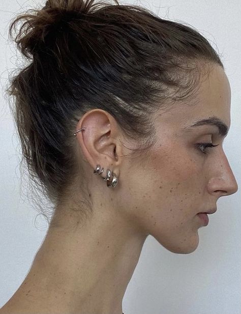 Septum Ear Piercing, Many Ear Piercings Aesthetic, Entire Ear Pierced, Nana Ear Piercings, Silver Piercing Ideas, Silver Hoop Earring Stack, Chunky Piercings, Ear Piercing Both Ears, Chic Piercings