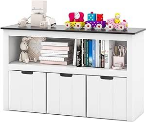 About this item ✔LARGE CAPACITY STORAGE- This kids storage cabinet has plenty of storage for your little one's belongings. Featuring spacious tabletop, large open shelf and 3 deep drawers, your children can place their favorite toys in a place, such as balls, toy cars, building blocks and others. ✔BLACKBOARD TOP & WHEELED DRAWERS- The blackboard top not only provides storage space for items, but also allows for writing and drawing. It is worth mentioning that all the drawers can be used separat Wooden Toy Storage Ideas, Kids Toy Storage Ideas Small Spaces, Small Toy Storage Ideas, Child Friendly Living Room, Bookshelf For Nursery, Living Room Toy Storage Ideas, Kids Storage Ideas, Toddler Bookshelf, Playroom Storage Ideas