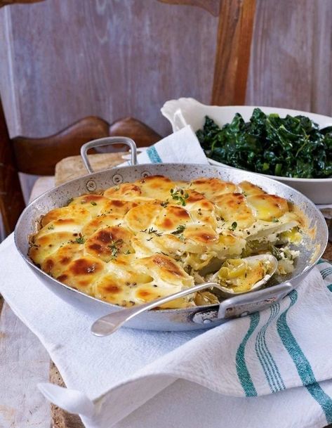 Gratin of potatoes and leeks with garlic and thyme | delicious. magazine Vegetarian Xmas, Vegetarian Christmas Dinner, Vegetarian Christmas Recipes, Potato Gratin Recipe, Panini Recipes Chicken, Christmas Dinner Recipes, Christmas Dinner Ideas, Vegetarian Christmas, Thyme Recipes