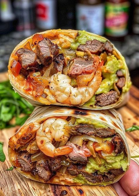 CookeryGems | 𝑨𝒊𝒓 𝑭𝒓𝒚𝒆𝒓 𝑺𝒖𝒓𝒇 𝑨𝒏𝒅 𝑻𝒖𝒓𝒇 𝑩𝒖𝒓𝒓𝒊𝒕𝒐 🌯🐟 | Facebook Surf N Turf Burrito, Surf And Turf Burrito, Surf N Turf, Tender Steak, Surf And Turf, Burritos, Air Fryer, Meal Planning, Surfing