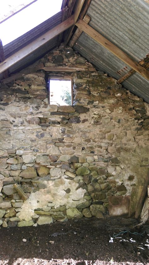 Outbuilding of cottage in Sligo. Concrete has been used for repairs but stone needs to breathe and lime mortar should be used. Concrete locks in water and the wall falls apart eventually. Maybe some odd eccentric people will buy the house and painstakingly rebuild it, that sounds like us. Stone Wall Cottage, Irish Stone Cottage, Stone Ruin Renovation, Istrian Stone House, Castle Bricks Stone Walls, Irish Houses, Old Irish, Stone Cottage, Old Stone