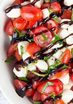 The Caprese Salad is a classic with the perfect trio of fresh mozzarella, fresh tomatoes and basil. Drizzled with a balsamic glaze it is the perfect summer salad! I'll answer all of your questions about how to make a delicious Chopped Caprese Salad. Balsamic Caprese Salad, Tomato Fresh Mozzarella Basil Salad, Caprese Salad With Balsamic Glaze, Chopped Caprese Salad, Tomato Mozzarella Salad Balsamic, Salad Caprese, Tomato Mozzarella Salad, Caprese Salad Recipe, Mozzarella Salad