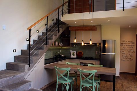 Mezzanine Above Kitchen, Kitchen Under Stairs Ideas, Kitchen Under Loft, Studio Loft Apartment Ideas, Kitchen Under Stairs, تحت الدرج, Stairs In Kitchen, Garage To Living Space, Tiny House Big Living