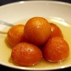 This is a traditional Indian dessert. Spongy milky balls soaked in rose scented syrup. Delicious with fresh cream, Kulfi, ice cream etc. To make it even more fancy, sprinkle gold-leaf on top of each serving. Pakistani Sweets, Sweet Fries, Gulab Jamun Recipe, Jamun Recipe, Rose Flavored, Gulab Jamun, Indian Dessert Recipes, Pakistani Food, Flavored Milk