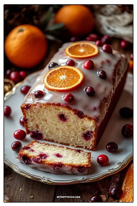 I just baked this delicious Cranberry Orange Loaf Cake! It’s perfectly moist, bursting with fresh cranberries, and topped with a sweet orange glaze. The bright flavors make it an ideal treat for any occasion. Trust me, you won't be able to resist a second slice! Cranberry Orange Bread Dried Cranberries, Cranberry And Orange Cake, Orange Cranberry Loaf Cake, Cranberry Orange Loaf Cake, Orange Cranberry Cake, Cranberry Orange Loaf, Orange Cranberry Loaf, Cranberry Loaf, Orange Loaf