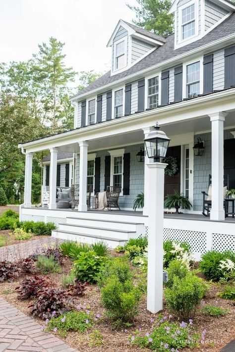 Considering adding a farmer’s porch? This New England Colonial farmer’s porch added so much character and charm to the front of a builder-grade center entry colonial home. #FrontPorch #FarmersPorch #PorchIdeas Colonial Farmers Porch, Colonial Homes With Front Porch, Front Porch Addition On Colonial House, Front Porch Colonial Style House, Front Porch On A Colonial House, Colonial Revival Front Porch, Adding A Front Porch To A Colonial, Front Porch Colonial House, Front Porch Addition Colonial