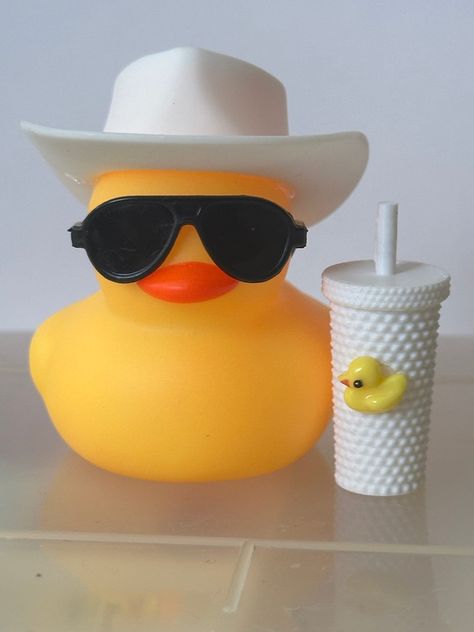 Cruising Ducks, Dashboard Ducks  These adorable cowboy and cowgirl ducks are perfect companions for your SUV or christmas adventure.  They make a delightful addition to your rubber duck collection. Coffee, black hat, sun glasses   If you're interested in a specific item or beverage, food not listed, feel free to inquire. Show your deep interest in ducks and decorate your car or suv with this rubber duck. This cowboy duck is the best decorative ornament and gives a luxurious touch.  Coffee duck i Duck Merch, Duck Collection, Duck Crafts, Duck Wallpaper, Rubber Duckies, Cute Ducklings, Duck Bird, Duck Toy, Disney Duck