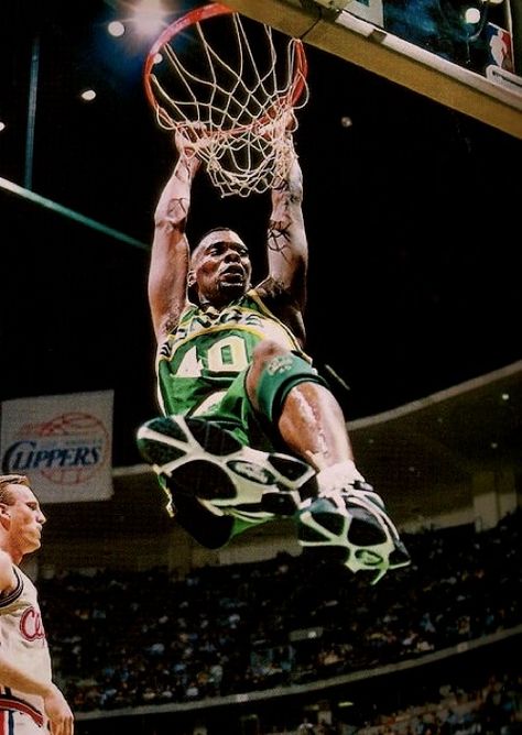 Shawn Kemp Shawn Kemp, Seattle Supersonics, American Athletes, Larry Johnson, Seattle Sports, School Basketball, Hoop Dreams, Portland Trail Blazers, Nba Legends