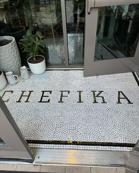 Entrance mosaic tile @chefikadallas looks outstanding. Completed @monasmosaic shipped and received in less than three weeks. So happy to see it installed #custommosaic #mosaictile #antiquefloor #floorart #tile #tiledesign #tileart #mosaicart #modernmosaic #customfloors #shopdesign #shopentranceEntrance Porch Mosaic custom made, Mosaic doorstep - Custom Made - ready to install Tile Restaurant, Name Lettering, Tile Background, Custom Wood Boxes, Mosaic Tile Designs, Antique Flooring, Gold Tile, Mosaic Floor Tile, Modern Mosaics