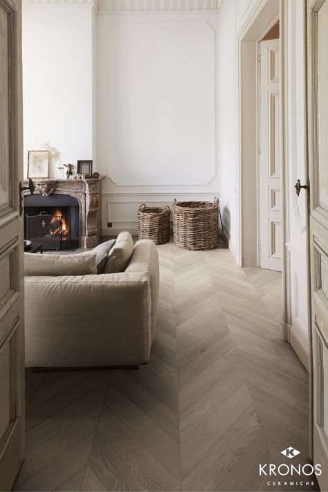 Floor design ideas: wood look effect porcelain stoneware tiles with chevron pattern. Collection by Kronos Ceramiche: Les Bois - Chevron Slavonia #kronostiles #kronosceramiche #madeinitaly #porcelaintiles #porcelainstoneware #gresporcellanato #grescerame #feinsteinzeug #tiles #luxurytiles #fliesen #tegels #carreaux #livingroom #livingroomdesign #woodtiles #floortiles #woodlook #darkwoodtiles #woodeffect #greseffettolegno #holzoptik #aspectbois #design #interiordesign #archilovers #architect Chevron Floor Tile, Chevron Tiles Floor, Timber Tiles, Chevron Tile, Living Room Tiles, Wood Parquet, Styl Glamour, Living Room Flooring, New Living Room