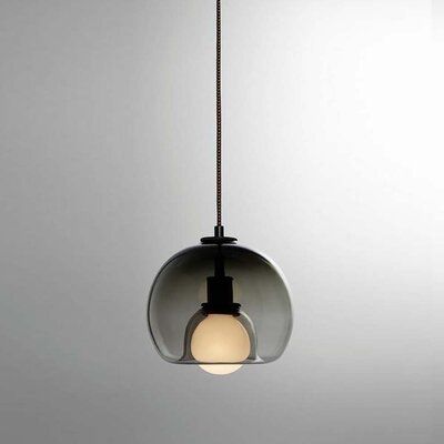 A classic globe shape gets an elegant, modern upgrade in this pendant light. Perfect for cultivating that must-have minimalist look, this design features a simple carved glass shade that ensconces a single bulb (not included). | Corrigan Studio® 10" Nordic Style Globe Shape Yellow Glass Pendant Light Glass in Gray, Size 10.0 H x 10.0 W x 10.0 D in | Wayfair Kitchen Bar Lighting, Glass Orb, Metal Lamp Shade, Globe Pendant Light, Modern Lamp Shades, Suspension Design, Hanging Fixture, Glass Pendant Lamp, Grey Glass