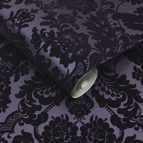 Gothic Damask Plum contrasts an opulent flock design with an equally luscious color palette. A raised pattern is created by sprinkling powdered wool and a shimmer plum backdrop is added that lends itself to promote a classic and sleek look. This wallpaper is beautifully metallic and rich in pattern resulting in a sophisticated look. Plum Wallpaper, Gothic Decor Bedroom, Flock Wallpaper, Purple Gothic, Gothic Bedroom, Purple Bedroom, Dark Home Decor, Goth Home, Goth Home Decor