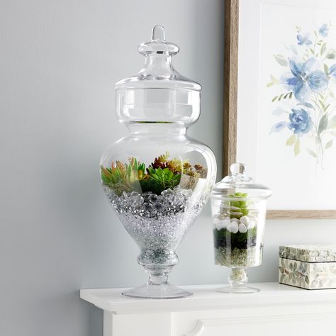 Purchase the Clear Mini Discs by Ashland® at Michaels. These clear mini discs by Ashland are ideal to accentuate the charm of your floral arrangements, glass vases and other displays. These clear mini discs by Ashland are ideal to accentuate the charm of your floral arrangements, glass vases and other displays. Use these beautiful discs to decorate anything from terrariums and fairy gardens to mosaic artwork and more. Details: Clear 16.5 oz. (467.7 g) Acrylic | Clear Mini Discs by Ashland® | 16. Glass Jar Filler Ideas, Floral Arrangements Table Centerpieces, Jar Filler Ideas, Apothecary Jars Decor, Organize Bathroom, Powder Room Remodel, Jar Fillers, Glass Candy Jars, Glass Apothecary Jars