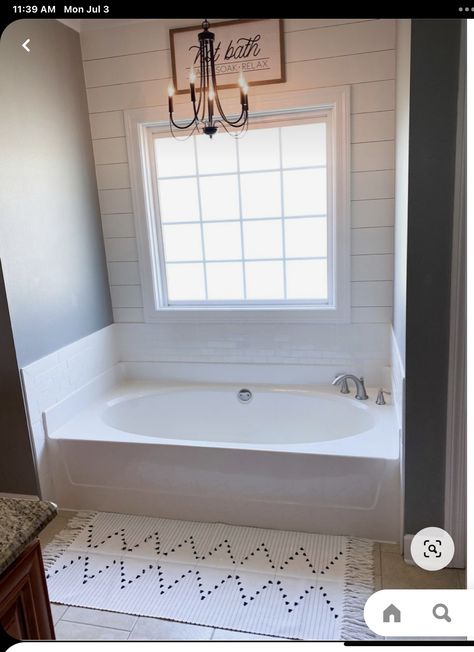 Light Above Bathtub Master Bath, Bathroom Accent Wall Above Tub, Shiplap Garden Tub, Taking Out Bathtub Master Bath, Lights Above Bathtub, Black Bathroom Chandelier Over Tub, Light Fixture Above Bath Tub, Lights Over Bathtub, Over The Tub Lighting