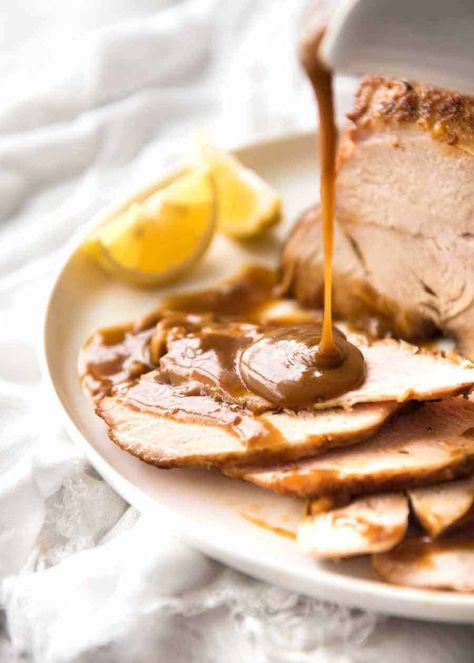 Gravy being poured over Slow Cooker Turkey Breast slices Moist Turkey Breast, Butterball Turkey Breast, Turkey Breast Recipes, Turkey Gravy From Drippings, Turkey Breast Crockpot, Moist Turkey, Butterball Turkey, Cooking Turkey Breast, Slow Cooker Turkey Breast