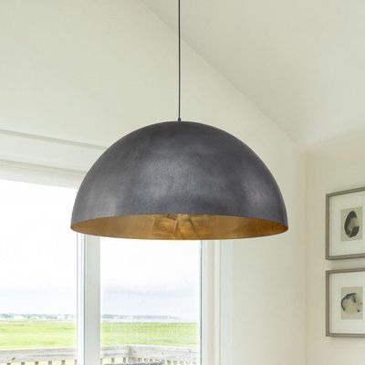 This industrial and bold 1-light metal dome pendant is a marvel perfect for modern or industrial rooms. The single dome light is spun from iron for a smooth & durable surface. It features a dome shape that takes light and spreads it evenly through the wide opening below to create a filling-down glow. The interior of the dome is finished in complementary metallic shades that shine when lit. This metal dome hanging light is a great option for kitchen island lighting or lighting over a kitchen tabl Ceiling Dome Lights, Dome Pendant Kitchen Table, Dome Pendant Lights Over Kitchen Island, Large Kitchen Pendant Lights, Modern Pendant Lighting Kitchen Island, Black Dome Pendant Light, Dome Light Fixture, Lights Over Island, Lights Over Kitchen Island