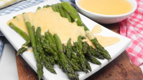 Roasted Asparagus with Smoky Gouda Cheese Sauce Recipe - Allrecipes.com Asparagus With Cheese Sauce, Sauce For Asparagus Recipes, Cheese Sauce For Asparagus, Gouda Sauce, Gouda Cheese Sauce, Asparagus With Cheese, Asparagus Sauce, Asparagus Side, Asparagus Side Dish