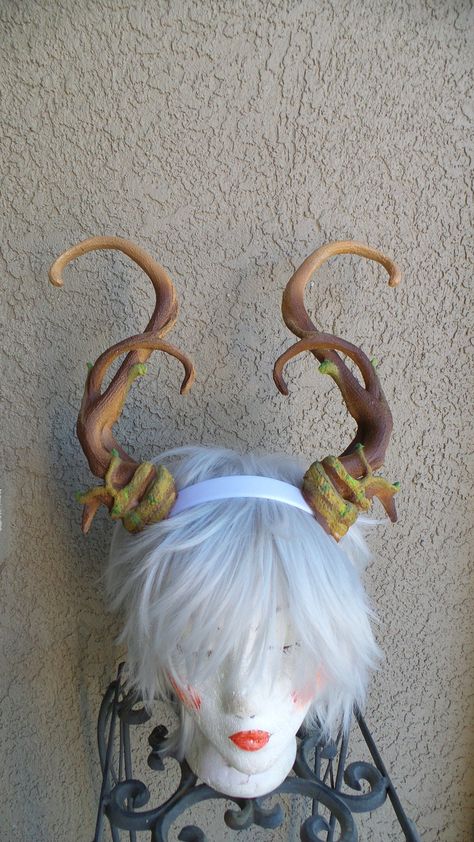 "They are large and majestic, statement cosplay fantacy forest dragon horns 3D printed lightweight. May be selected unpainted for your own project. The length is about 10\". The set is attached to a headband. Painted in natural browns with a touch of green leaf buds Also awailable in plane colors white or Black for your own paint ideas. This set is a more masculine version of the fawn fairy horns as seen on the last picture you can check them out here https://www.etsy.com/listing/621384879/new-a Sagittarius Halloween, Fairy Horns, Dnd Fairy, Diy Horns, Whimsical Dragon, Cosplay Horns, Forest Dragon, Dragon Horns, Halloween 23