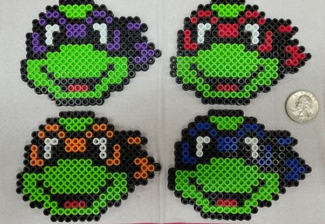 Raphael, Leonardo, Dante, and Michelangelo Materials: magnets and Perler beads Perler Magnets, Tmnt Perler Bead Patterns, Ninja Turtles Perler Beads, Perler Bead Chameleon, Perler Bead Patterns Ninja Turtles, Tmnt Perler Beads, Perler Ninja Turtle, Perler Creations Magnets, Teenage Mutant Ninja Turtles Pixel Art