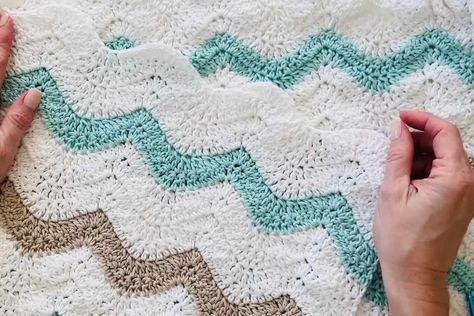 Crocheting a blanket that captures the gentle flow of ocean waves is a delightful way to combine creativity with relaxation. This beginner-friendly ripple Crochet Ocean Blanket, Crochet Wave Blanket, Crocheting A Blanket, Crochet Waves, Ocean Blanket, Crochet Ocean, Handmade Gifts For Friends, Feather Stitch, Farm Crafts