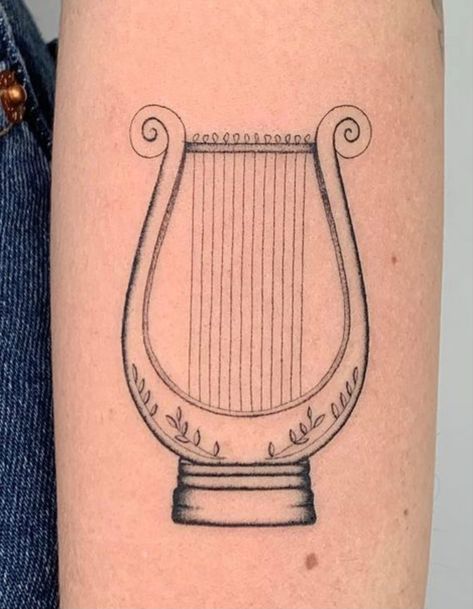 Apollo Tattoos Greek God, Light Academia Tattoo Ideas, Lyre Tattoo Orpheus, Lyre Tattoo, Hadestown Tattoo, Song Of Achilles Tattoo, Harp Tattoo, Achilles Tattoo, Hermes Tattoo