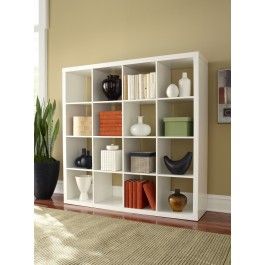 58.625"H Square Bookcase: Sixteen storage cube space White finish Assembles quickly and easy to clean Material conform to CARB regulation Inside Dimension of Each Cube:13.25 in W x 15.25 in D x 13.25 in H