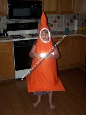 Homemade Traffic Cone Costume: We wanted to make a cool costume for our 6 year old so we decided on a Traffic Cone Costume. My husband welded a light weight wire frame for the lower Cone Halloween Costume, Traffic Cone Costume, Cone Costume, Cones Diy, Kids Homemade, Traffic Cone, Halloween Costume Idea, Diy Halloween Costumes Easy, Diy Halloween Costume