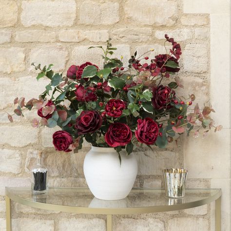 ‘Tis the season for red roses!

Reds and greens have long been the colours we associate with Christmas. For an opulent twist, we have combined our Luxury Bella Roses with Burgundy Cabbage Roses, nestled beside the deep greens of our French Ivy stems. For further depth and an added Winter feel, you can then intersperse sprays of Blush Eucalyptus, Seasonal Rosehip, and Burgundy Dogwood. Cabbage Roses, Deep Green, Tis The Season, Artificial Flowers, Red Roses, Ivy, Christmas Decor, Blush, Roses