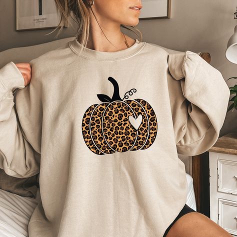 Leopard Pumpkin Shirt, Cheetah Pumpkin Shirt,Thanksgiving Shirt, Thankful Shirt,Fall Shirt, Hello Pumpkin,Family Matching Shirt Leopard Pumpkin Sweatshirt is stylish and cozy enough for the fall season. Welcome to the different, crazy and colorful world of ORANGE WORLD :) PRODUCT DETAILS Collar, shoulders, armholes, cuffs and hem double-needle stitched  -  1 x 1 rib with spandex Features a crewneck -  Relaxed fit - Unisex -  50% cotton 50% polyester HOW TO ORDER 1- Please review all photos, 2- C Fall Family Shirts, Cheetah Pumpkin, Pumpkin Family, Leopard Pumpkin, Thanksgiving Sweatshirt, Pumpkin Sweatshirt, Thankful Shirt, Diy Shirts, Merch Ideas