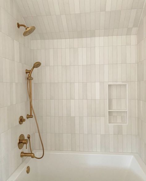 Antique White Tile Bathroom, Large Tiles Around Bathtub, Stacked Shower Tile Ideas, Long Tile Shower Wall, Shower With Ceiling Tile, White Stacked Tile Shower Wall, Neutral Subway Tile Bathroom, 3x12 Shower Tile, Bathroom Tile Ceiling