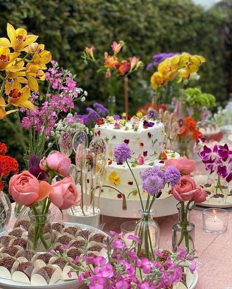 Flowers Dessert Table, Birthday Party Flower Decoration, Table Of Desserts, Spring Flower Party Decorations, Colorful Flower Birthday Theme, Dessert Table Garden Party, Flower Theme Bday Party, Eclectic Birthday Decor, Flower Decor For Party