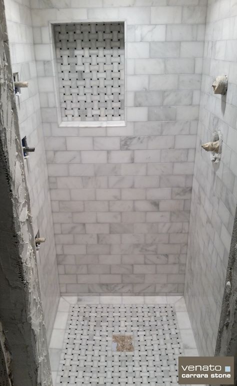 Carrara Venato Dogbone Basketweave Mosaic $12.95SF and Venato 3x6" Honed Subway Tile $7.00SF An almost completed Carrara Venato shower.  The Dogbone mosaic looks great and the 3x6" is perfect.  Wha... Small Basement Bathroom, Basement Bathroom Design, Basket Weave Tile, Carrera Marble, Master Bath Ideas, Bath Tiles, Master Bathrooms, Bathroom Shower Tile, Bathroom Remodel Shower