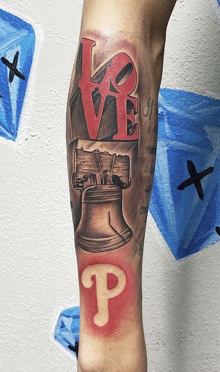 Rap Tattoo Ideas For Men, Nipsey Hussle Flag Tattoo, Philly Tattoo, Trap House Tattoo Design, Atl Tattoo Sleeve, Trap House Tattoo, Tupac Sleeve Tattoo, Trap Tattoos Men, Simple Arm Tattoos