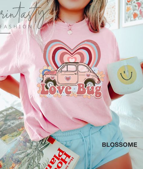 Get ready to celebrate love in style with our trendy Valentine's Shirt! This charming and fashionable shirt is perfect for expressing your affection. It's designed with the utmost care to ensure comfort and versatility. Elevate your Valentine's Day look with this essential piece. Available in a variety of sizes and colors. Spread joy and warmth this Valentine's Day with our must-have shirt! #ValentinesDayFashion #LoveIsInTheAir #ShareTheLove Valentines Day Shirts For Teachers, Valentine Shirts Vinyl, T Shirt Text Design, Bug Valentines, Couple T Shirt Design, Tshirt Prints, Uv Tattoo, Painted Clothing, Circuit Ideas