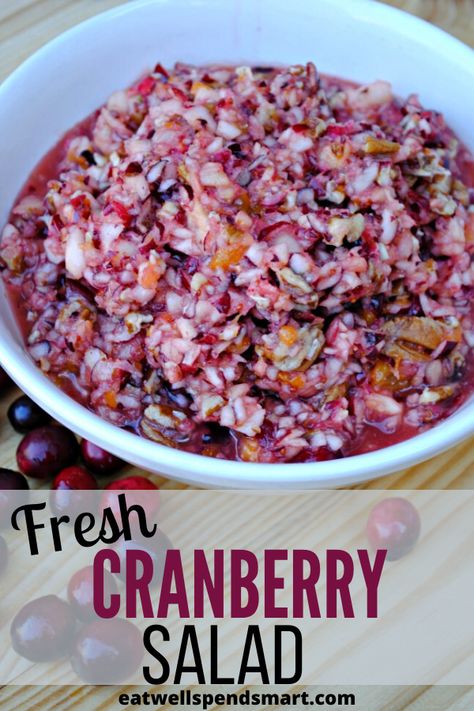 Looking for a fresh spin on cranberry sauce? Try this fresh cranberry salad. It is made with sweet fruit like apples, mandarin oranges and pineapple to balance the tart flavor of the fresh cranberries. Honey is added for some additional sweetness while pecans give it some crunch. Your family will love this fresh cranberry salad. #thanksgiving #sidedish #realfood #healthy #cranberry Cranberry Apple Relish, Fresh Cranberry Salad, Cranberry Orange Relish Recipes, Cranberry Orange Relish, Processor Recipes, Fresh Cranberry, Cranberry Relish, Cranberry Apple, Cranberry Salad