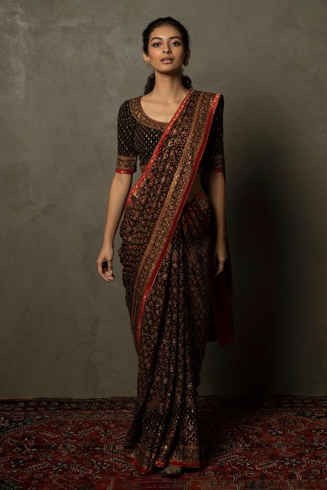 Black saree with all-over floral embroidery. Comes with unstitched blouse fabric. Component: 2 Pattern: Embroidered Type Of Work: Floral Pattern Fabric: Silk Chinon Color: Black Other Details:  Contrast border Weight: 670 grams Note: The blouse worn by the model is not for sale Occasion: Reception - Aza Fashions Ritu Kumar Saree, Indian Dress Up, Indian Sari Dress, Black Floral Pattern, Ritu Kumar, Desi Fashion Casual, Indian Dresses Traditional, Black Bridal, Embroidered Saree