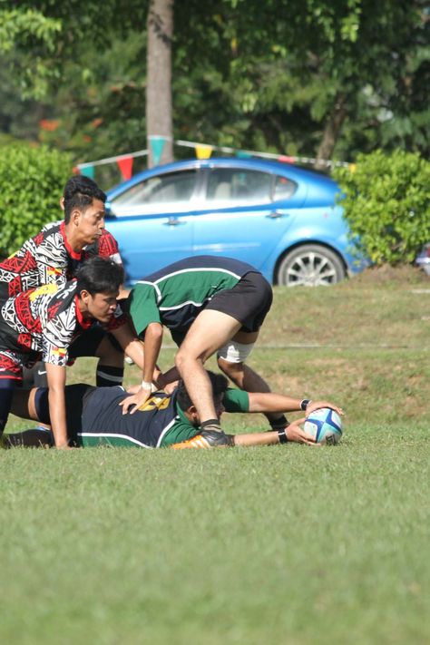 Rugby player presenting the ball correctly in a ruck Rugby Club, Rugby