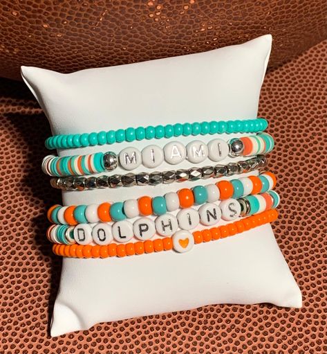 Miami Dolphins Bracelets, Nfl Clay Bead Bracelets, Heishi Bracelet Diy, Nfl Bracelets, Florida Dolphins, Stretch Beaded Bracelets Diy, Diy Bracelets With String, Heishi Bracelet, Beaded Braclets