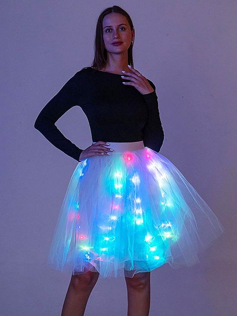 Illuminate the night with this vibrant Glow in the Dark Multicolored LED Tulle Tutu Skirt. Made with soft layers of tulle and a comfortable chiffon lining, it’s both stylish and comfortable. Multicolored LED lights add a glowing touch, powered by long-lasting AA batteries. Perfect for festivals, parties, or any event where you want to shine. […] Glow in the Dark Multicolored LED Tulle Tutu Skirt on GlowInTheDarkStore.com Light Up Tulle Skirt, Glow Skirt, Glow In The Dark Fashion, Black Glow In The Dark Crew Neck Top, Glow In The Dark Fabric, Led Jacket, Neon Bodysuit, Jellyfish Design, Tulle Tutu Skirt