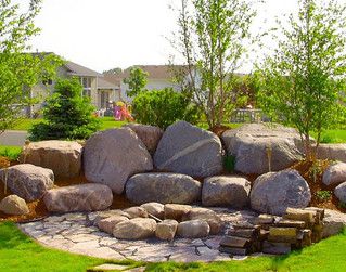 Boulder Landscape with Firepit | Backyard fire pit and firep… | Flickr Outside Fire Pits, Easy Fire Pit, Small Fire Pit, Fire Pit Landscaping, Landscaping With Boulders, Stone Fire Pit, Concrete Fire Pits, Fire Pit Area, Fire Pit Designs