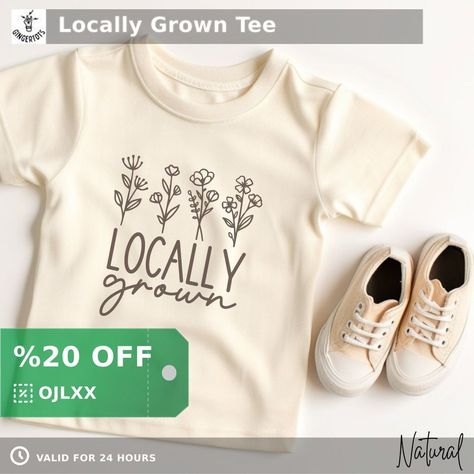 Alternative-trendy graphic tees for alternative-trendy moms and kids! WE GOT YOU! Check this out >>> 😍 Locally Grown Tee 😍 by Ginger Tots Co. 👉 Find the link in our bio Toddler Girl Shirt Ideas, Toddler T Shirt Ideas, Toddler Shirts Vinyl, Cricut Tee Shirt Ideas, Toddler Shirt Ideas, Toddler Tshirt Ideas, Kids Tshirt Designs, Screen Printing Clothes, Toddler Graphic Tee