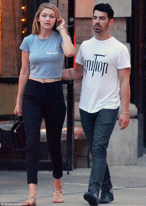 Gigi Hadid and boyfriend Joe Jonas enjoy a quick smooch in New York #dailymail Gigi Hadid Boyfriend, Gigi Hadid Outfits, Gigi Hadid Style, Bella Hadid Outfits, T Strap Flats, Hadid Style, Joe Jonas, Stylish Boys, July 12