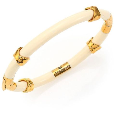 Tory Burch Women's Oro Wrapped Bangle Bracelet - Ivory (290 BAM) ❤ liked on Polyvore featuring jewelry, bracelets, apparel & accessories, ivory, tory burch jewellery, tory burch, tory burch jewelry, tory burch bangle and wrap bangle bracelet Shakha Pola Bangles, Gold Jhumka Earrings, Mens Gemstone Rings, Wrap Bangles, Gold Mangalsutra Designs, Wedding Day Jewelry, Designer Studio, Tory Burch Jewelry, Enamel Bangle