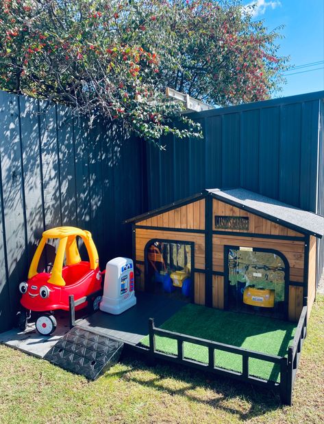 Image shows kennel converted to car garage with a wooden frame, grey painted deck. Two entry points and removable lid. Playhouse With Garage, Garage Playhouse, Kids Car Garage, Playhouse Remodel, Bungalow Backyard, Kids Village, Toddler Outdoor Play, Playhouse Diy, Kids Garage