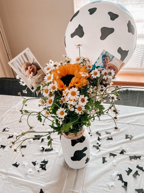 Cow Birthday Table Decorations, Cow And Daisy Birthday, Mason Jar Centerpieces Farm Theme, Cow Birthday Party Table Decor, Chic Fil A Party Ideas, Cow Party Table Decor, Cow Party Centerpiece Ideas, Holy Cow I’m One Table Centerpieces, Highland Cow Party Centerpiece