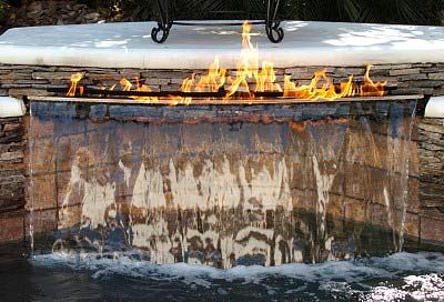 "Pool on fire" waterfall Waterfall Grotto, Fire Pit And Pond, Best Pools, Indie Decor, Florida Pool, Outdoor Water Feature, Outdoor Water Features, Pool Waterfall, Beautiful Pools